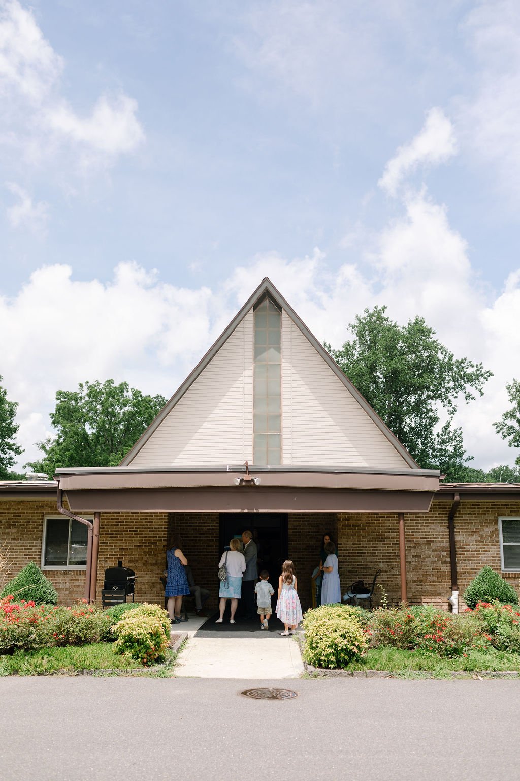The exterior of St. Andrew's Anglican Church on a Sunday morning.