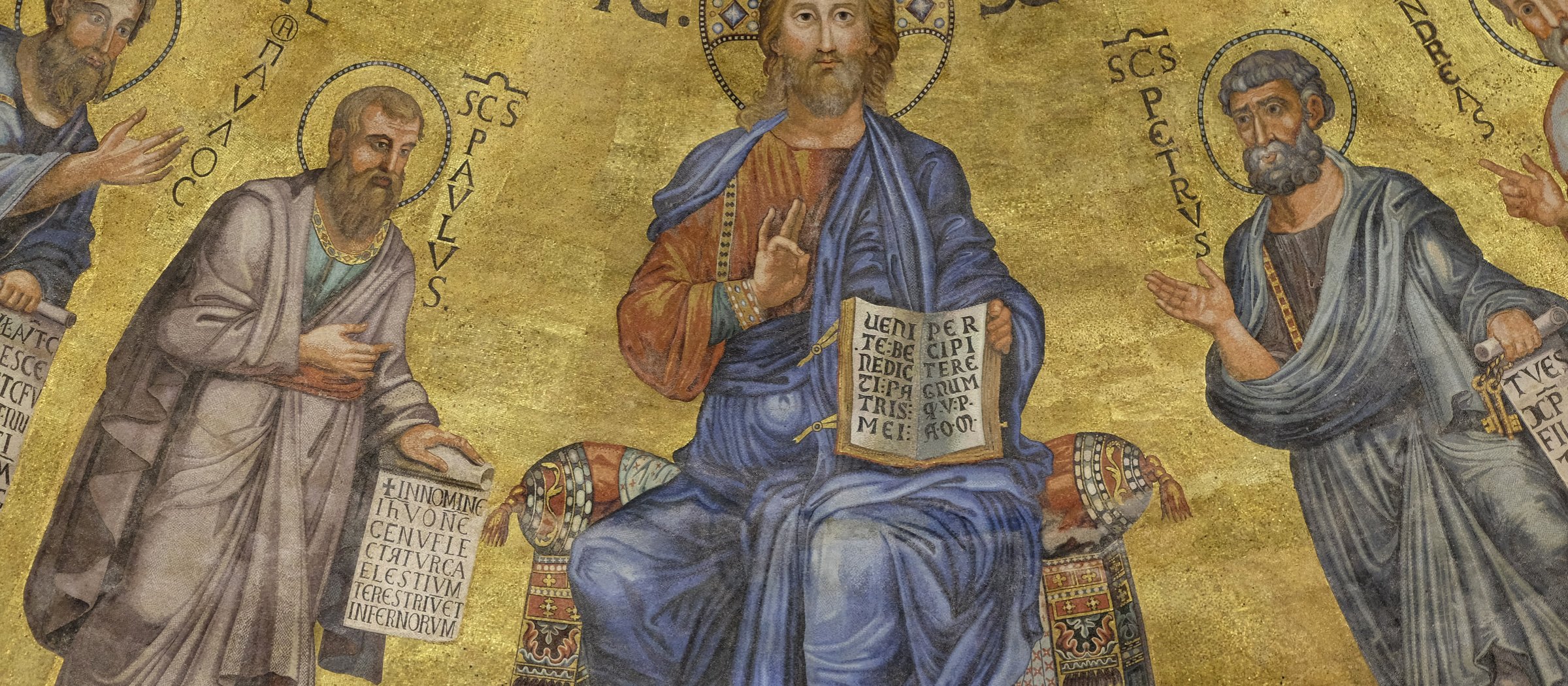 A Byzantine mosaic of Christ enthroned in glory, flanked by the apostles Paul, Peter, and Andrew.